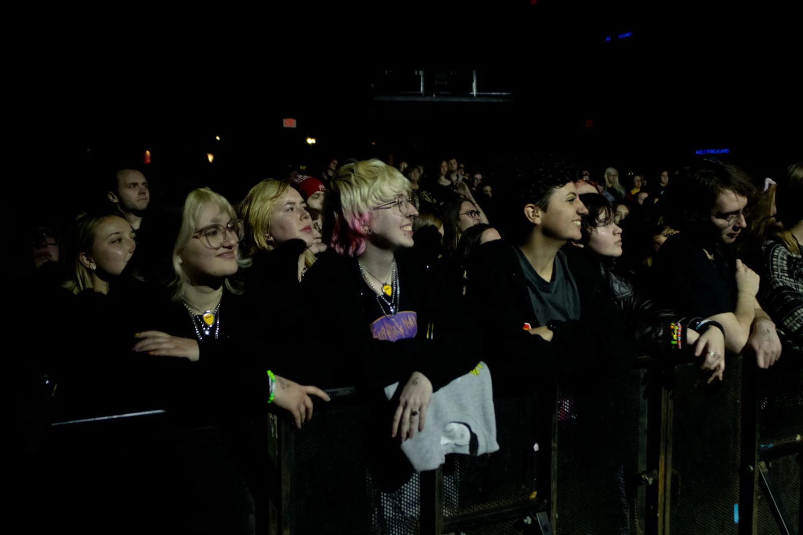 Fans at the barricade watching the show